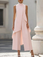 Lifestyle shot of a woman enjoying a special event in her comfortable and stylish jumpsuit.
