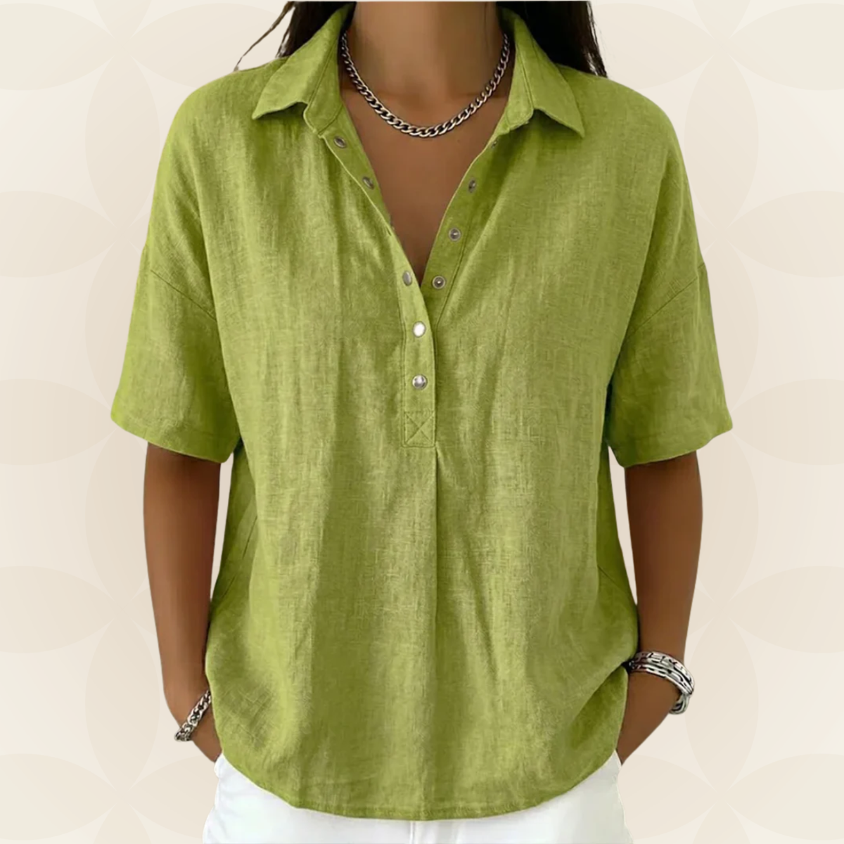 Close-up detail of the front button closure and sophisticated collar on a light blue shirt.