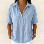 Back view of a pink cotton blend shirt, showing the smooth, flowy silhouette of the garment.