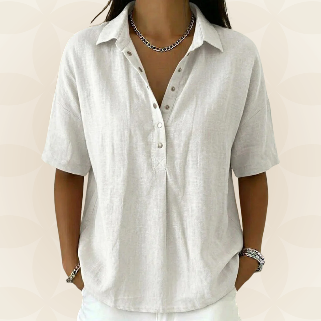 Elegant blue collared shirt displayed flat, emphasizing the quality and airy feel of the material.