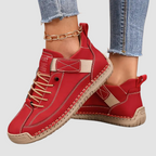 Model wearing pink sneakers with a casual outfit, styled for everyday wear and comfort.