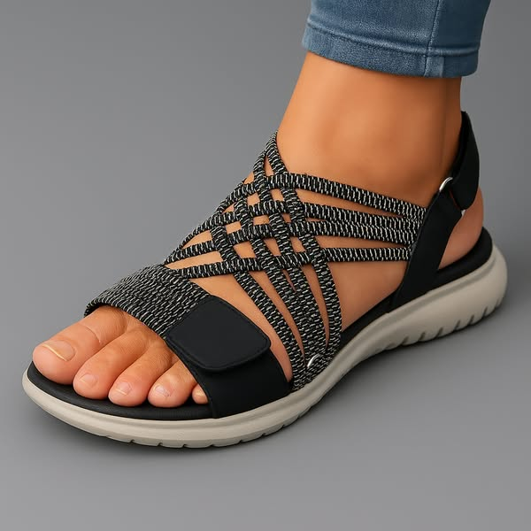 Detail view of the black walking sandals' soft, cushioned insole, emphasizing the supportive design for foot comfort.