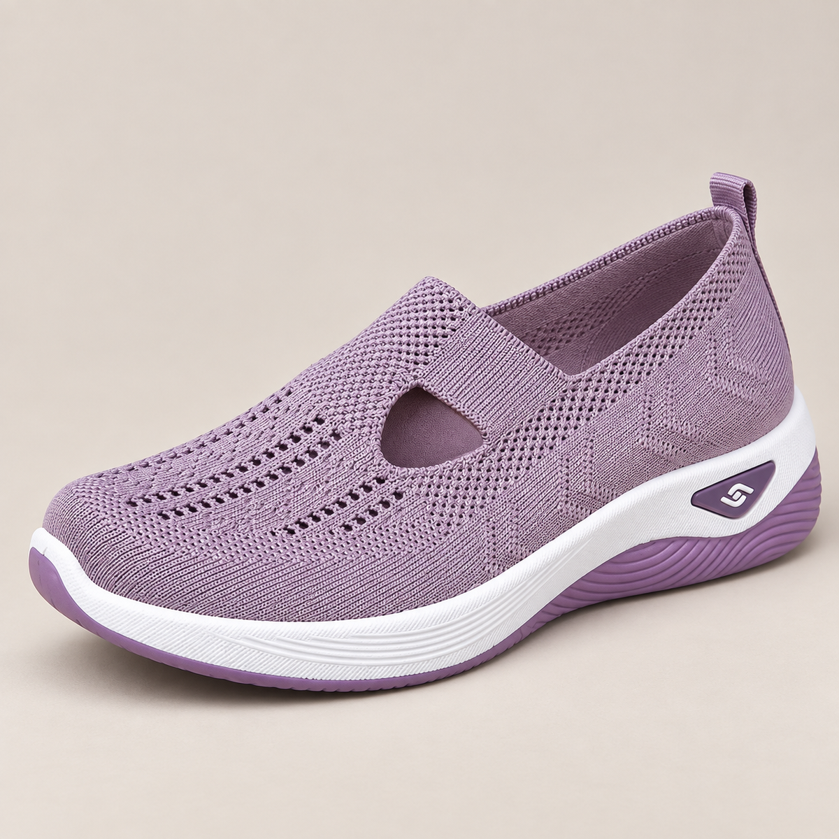 Close-up on the removable insole of a comfort sneaker, demonstrating its customizability.