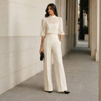 Detailed shot of the inner camisole included with the sheer sleeve blouse, demonstrating its comfortable layering.