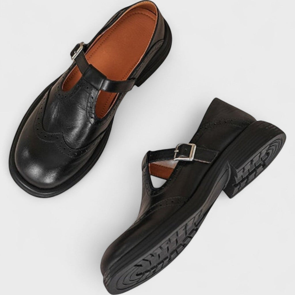 Close-up detail of the sophisticated stitching on the upper of a women's shoe, emphasizing quality craftsmanship.